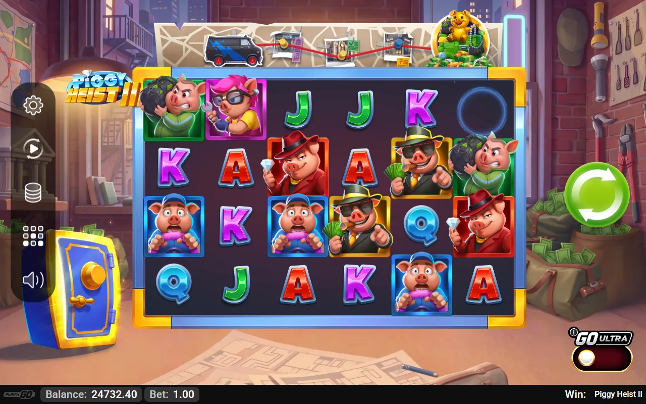 A dead spin on the Piggy Heist II reels with the closed safe on the left and the five-slot Vault Trail across the top