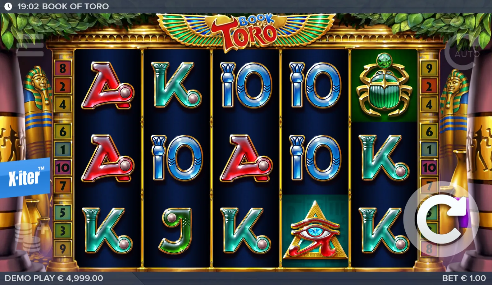 Book of Toro base game board with a scarab on reel five, an Eye of Horus on reel four and card royals everywhere else