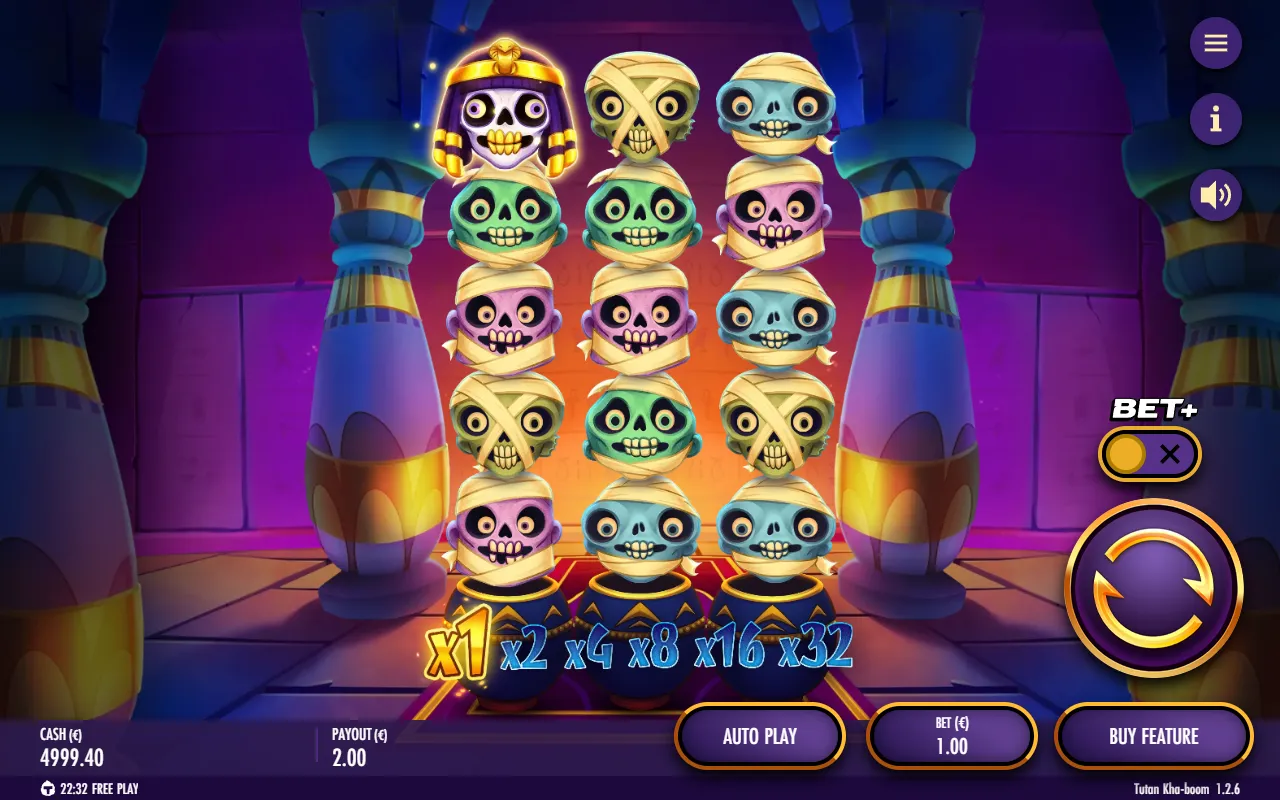Tutan Kha-boom base game board with three reels of mummies and the x1 to x32 multiplier ladder under the reels